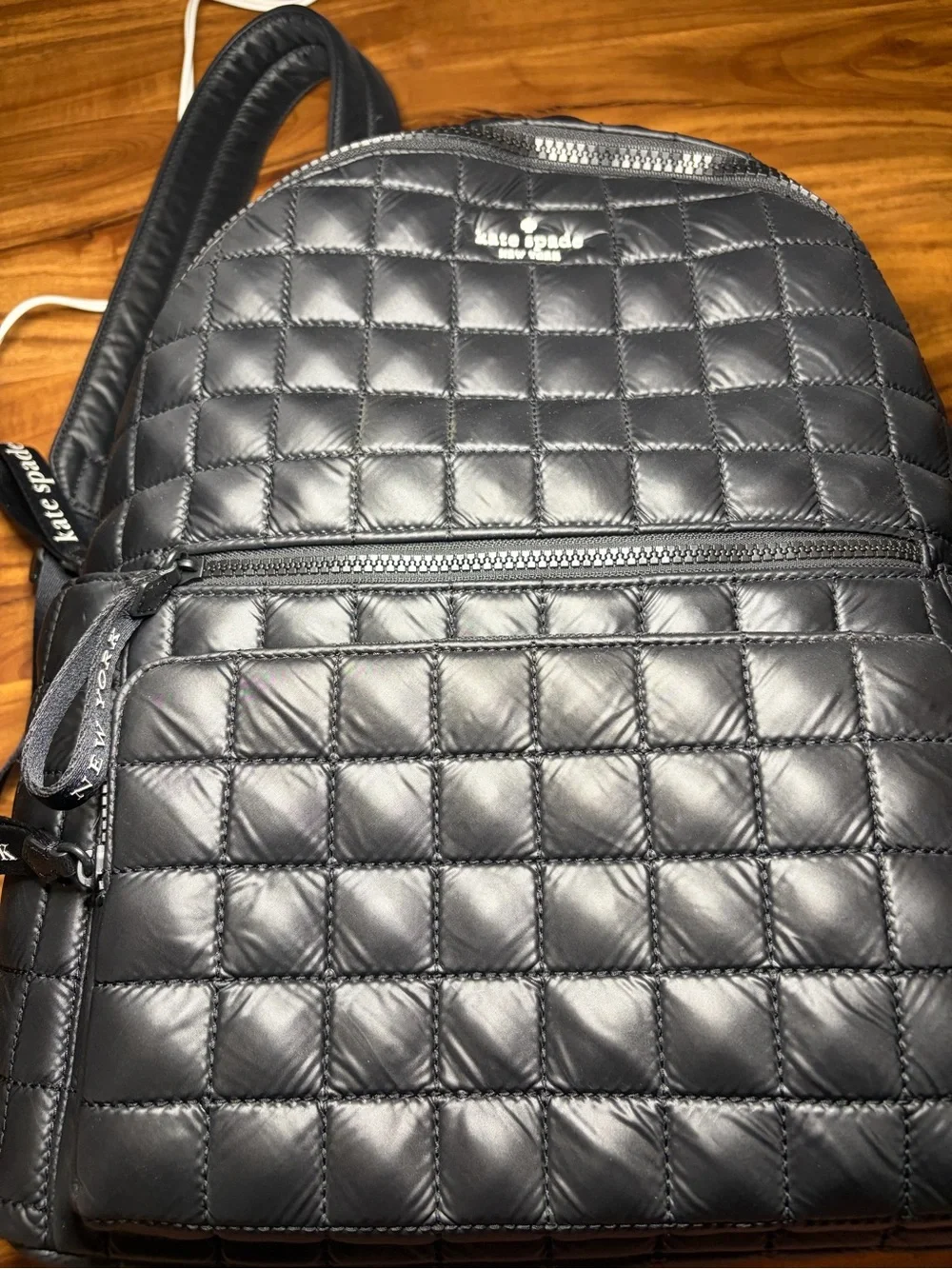 kate spade Black Quilted Leather Backpack with Front Zip Pockets